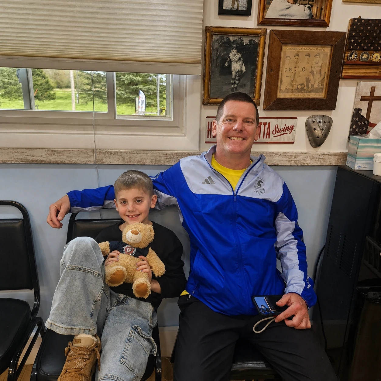 Cumming Barbershop customers inside the shop